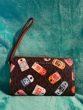 Michael Kors Brown Signature Wristlet with Multicolor Tag Print and Tan Strap